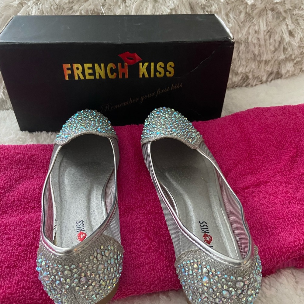 Slightly worn jeweled flats